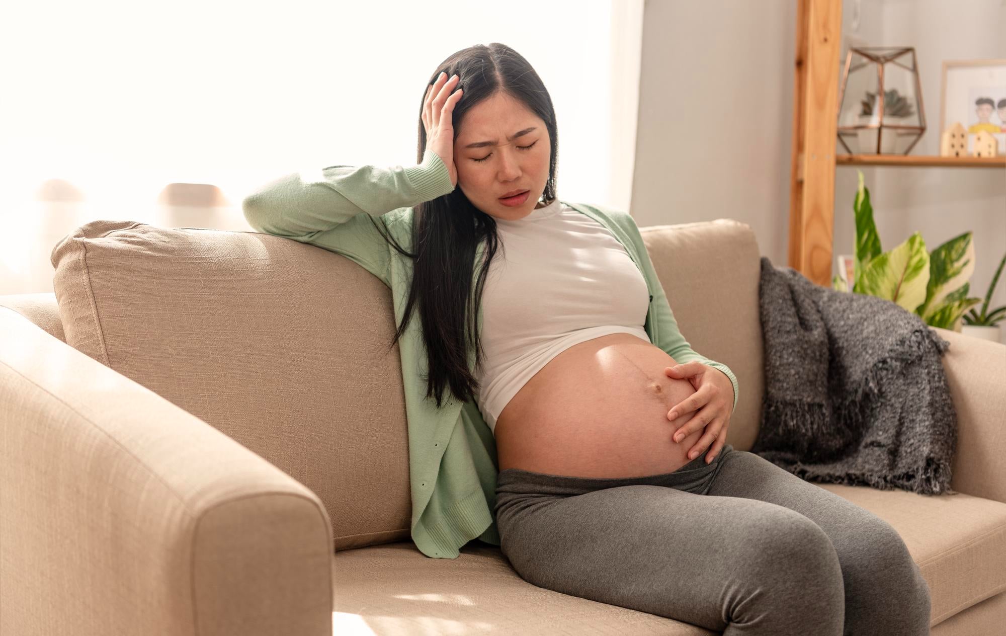 pregnant woman suffering from pain